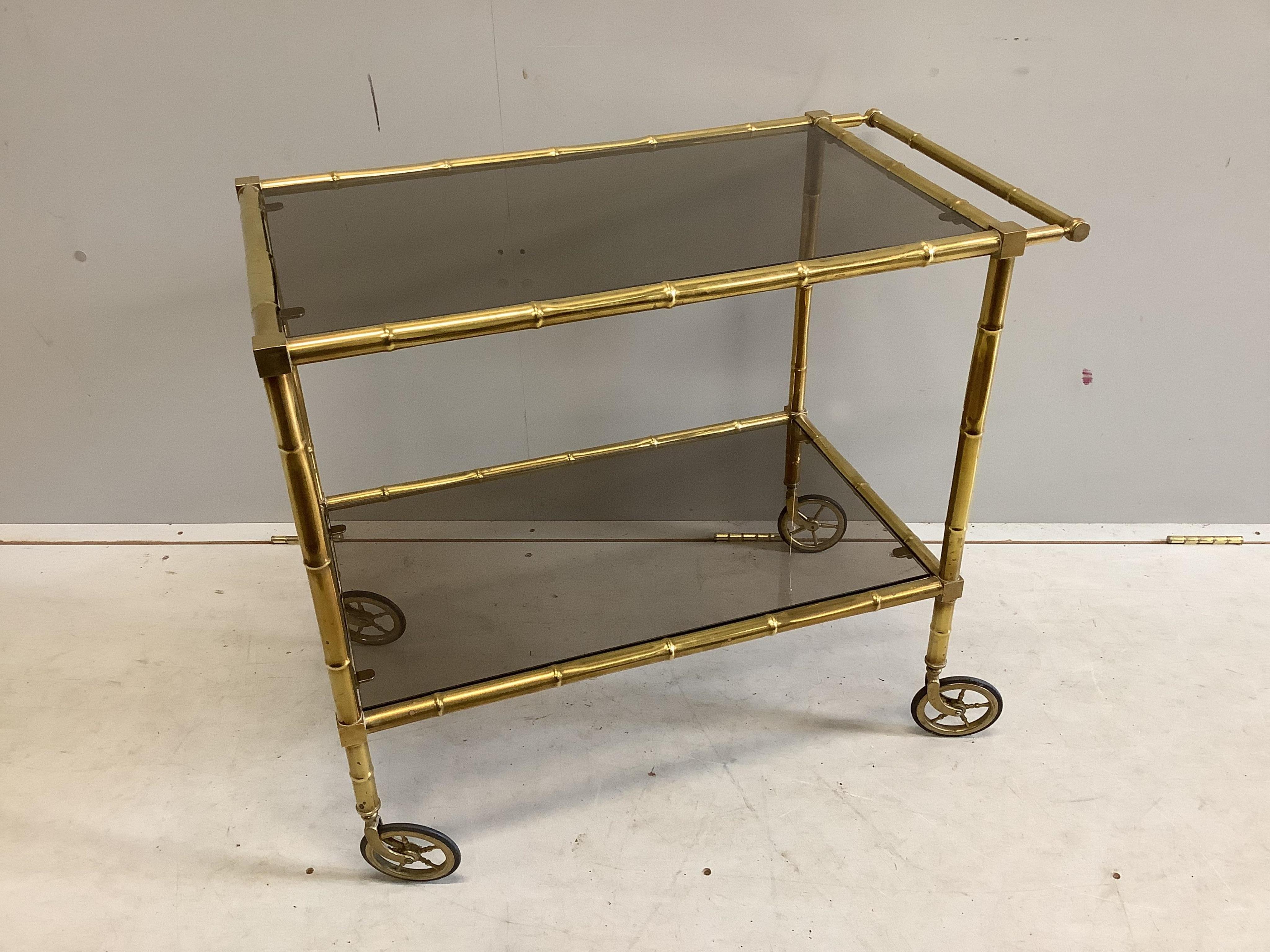 A Maison Jansen style faux bamboo brass two tier trolley, width 75cm, depth 42cm, height 65cm